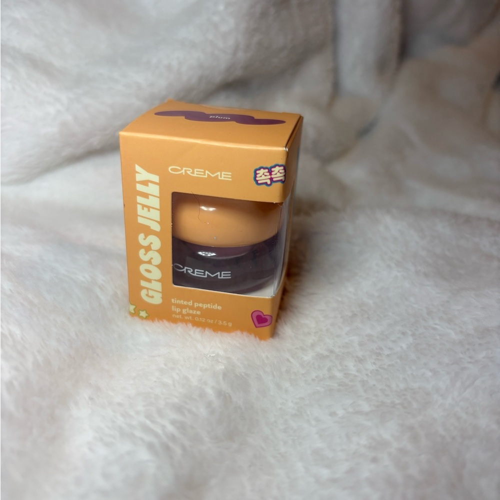 The Crème Shop Gloss Jelly in shade Plum Brand New in Box and Sealed!!!